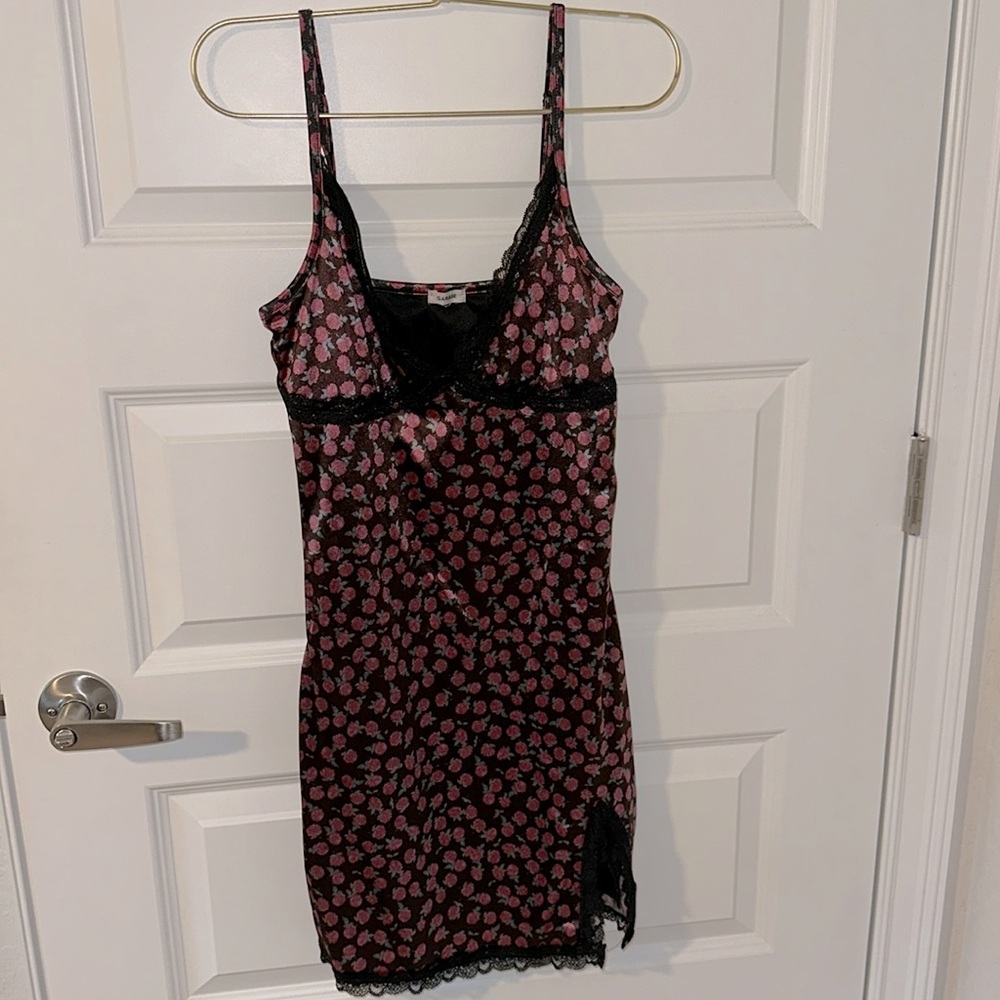 Garage- floral dress with lace. 
Lined. Adjustable straps. Size small.